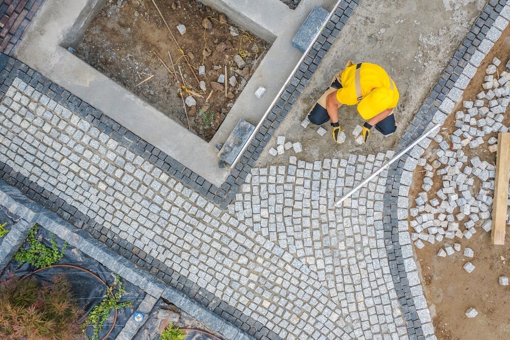 układanie kostki - cena za projekt z ciemniejszymi brzegami 